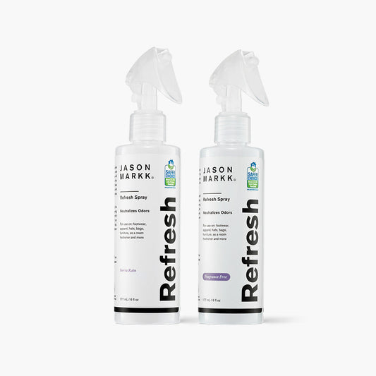 Jason Markk Refresh Spray in both Sierra Rain and Fragrance Free Scents in front of a white background.
