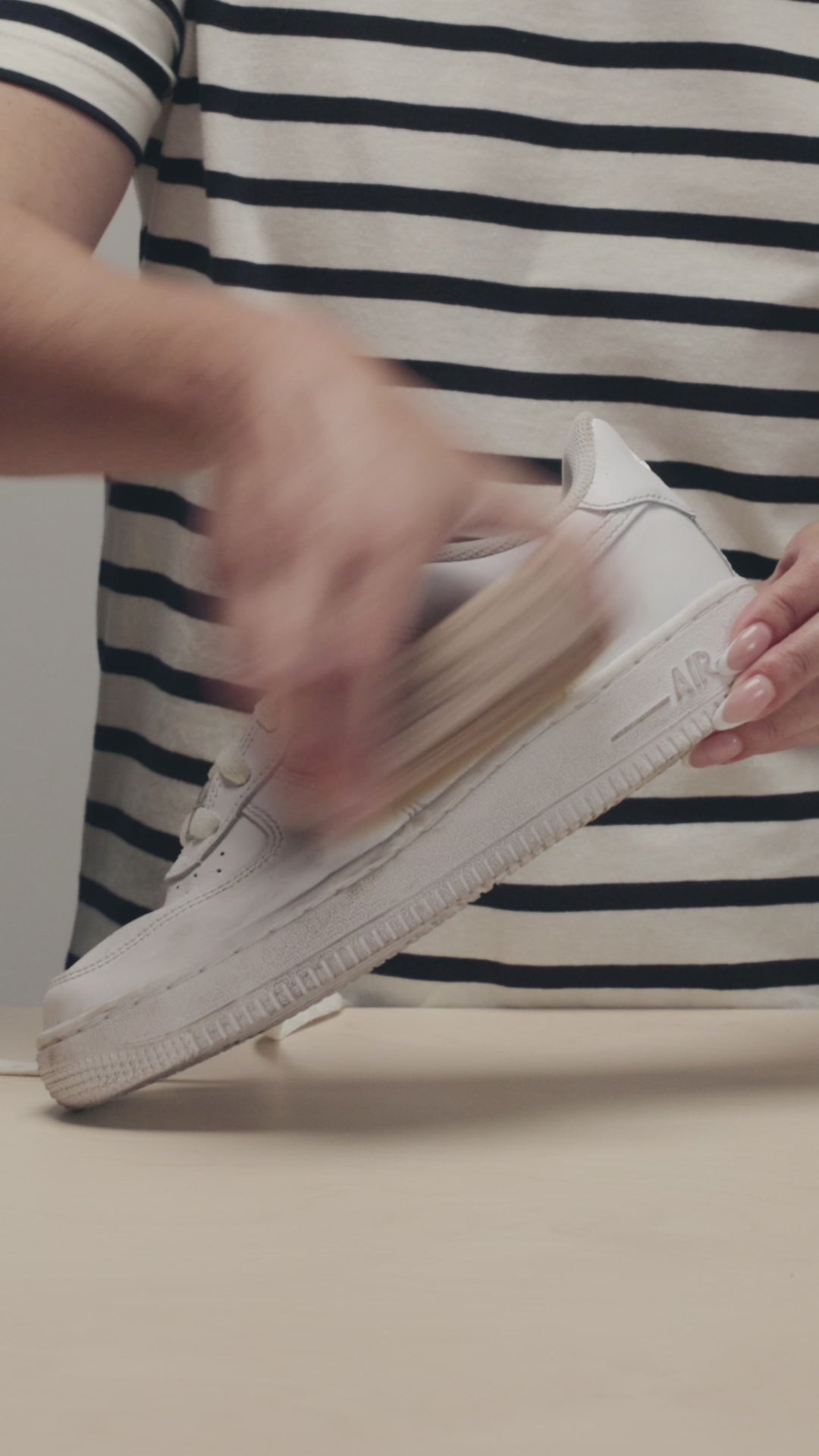 DRY BRUSHING A PAIR OF NIKE AIR FORCE 1 WITH A JASON MARKK DELICATES CLEANING BRUSH